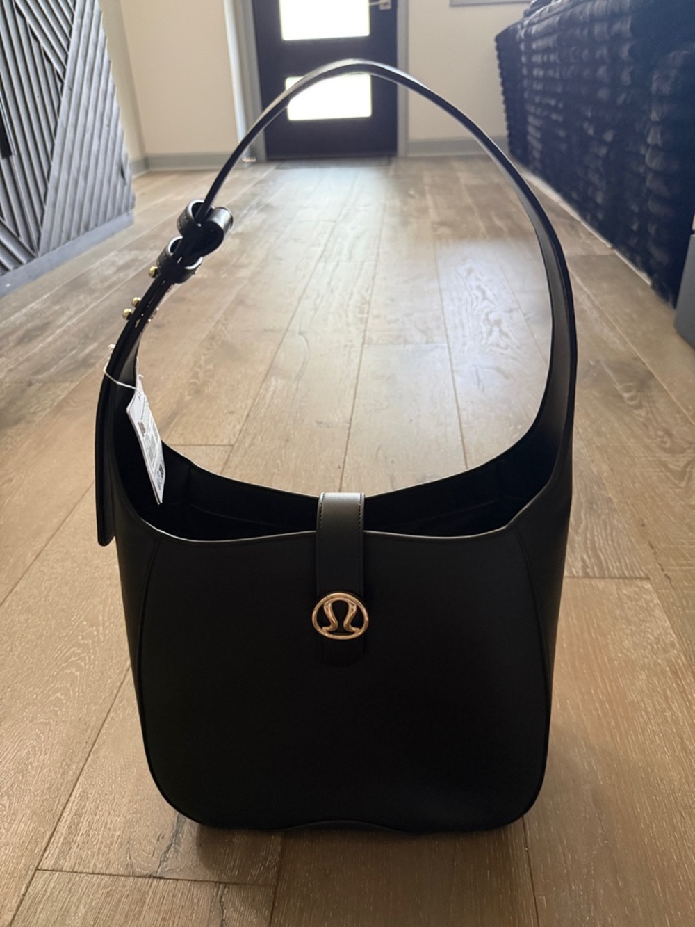 lululemon athletica Black Shoulder Bag with Gold Logo Accent